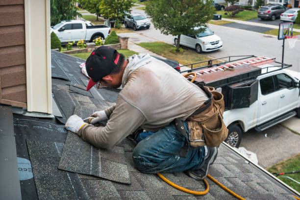 Professional Roofing technician working in Sea Cliff, NY